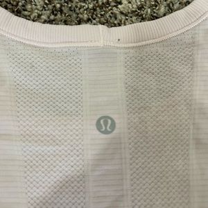 Light pink Lululemon tshirt